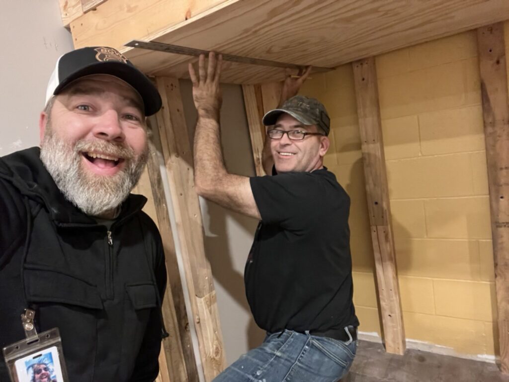 Parke Lucas and BGW Construction owner Bobby Williams framing the custom built-in bunk beds for the DCS safe space in Avon, Indiana