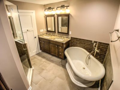 Luxury Bathroom with Freestanding Tub and Double Sink Vanity Spacious bathroom with freestanding tub, double sink vanity, and glass shower